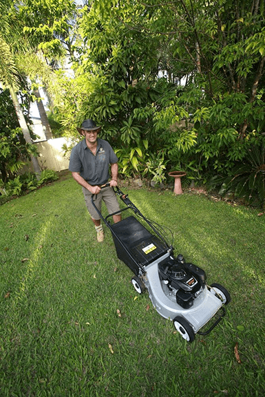 Lawn mowing Mackay — neatly striped residential lawn after a scheduled cut